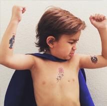 Honored Kid Benji flexing his muscles