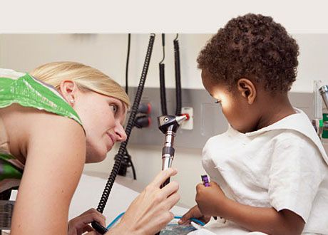 a child recieving an eye exam